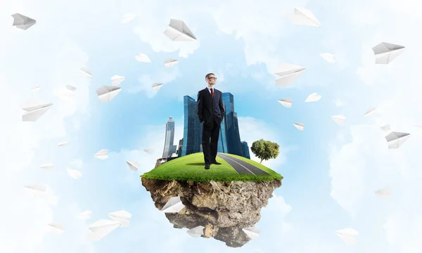Elegant Confident Businessman Standing Green Floating Island Blue Sky — Stock Photo, Image