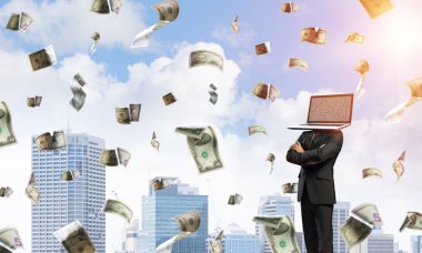 İş başı açık havada arka plan üzerinde cityscape manzaralı dolar uçak uçan arasında ayakta iken geçti silah tutmak yerine dizüstü bilgisayar ile takım elbiseli adamı resim kırpılmış.