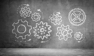 Vites mekanizması vasıtasıyla takım çalışması konsepti.