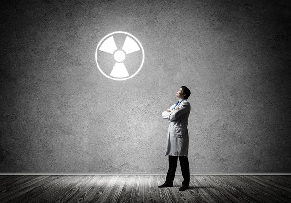Young Medical Industry Employee Standing Empty Room Interracting Glowing Radioactive — Stock Photo, Image