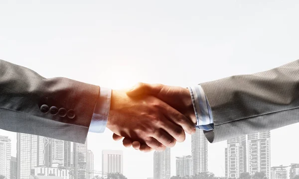 Close Business People Shaking Hands Symbol Partnership Mixed Media — Stock Photo, Image