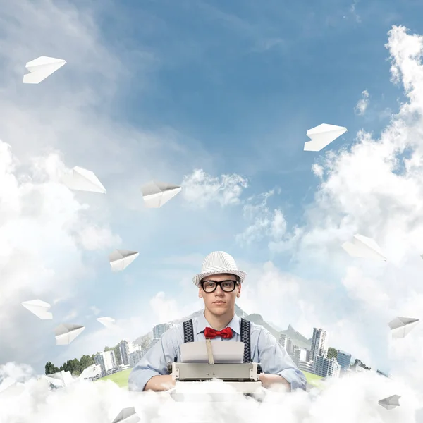 Young Man Writer Hat Eyeglasses Using Typing Machine While Sitting — Stock Photo, Image