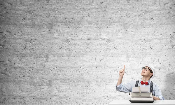 Young Man Writer Hat Eyeglasses Using Typing Machine Pointing Upside — Stock Photo, Image