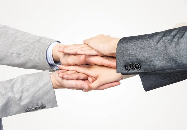 Close Empresários Colocando Mãos Juntas Contra Fundo Branco — Fotografia de Stock