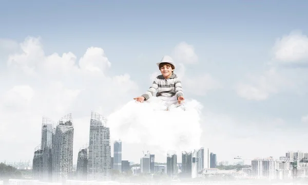 Young Little Boy Keeping Eyes Closed Looking Concentrated While Meditating — Stock Photo, Image