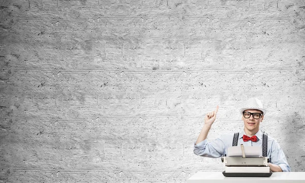 Young Man Writer Hat Eyeglasses Using Typing Machine Pointing Upside — Stock Photo, Image