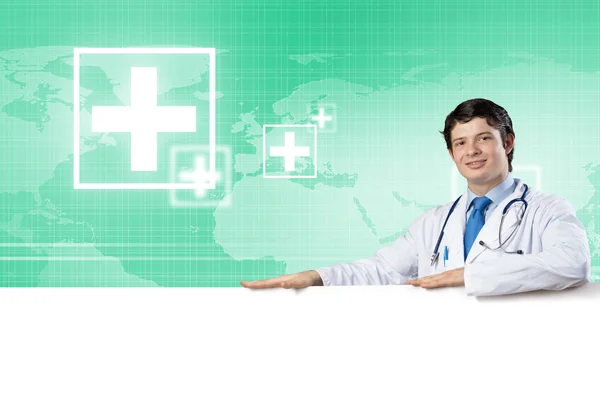 Young Handsome Doctor Holding White Blank Banner Place Your Text — Stock Photo, Image