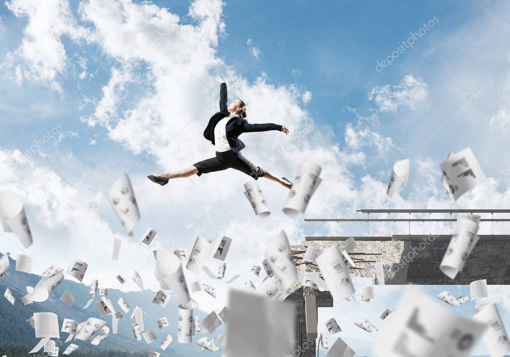 Business woman jumping over gap in bridge among flying papers as symbol of overcoming challenges. Skyscape and nature view on background. 3D rendering.