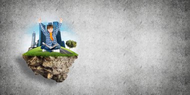 ECO konsepti yüzen ada ve üzerinde kitap oturan mutlu çocuk.