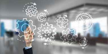 Takım çalışması konsepti ve zarif modern iç mekanlarda iş adamlarının jestlerini seçmek