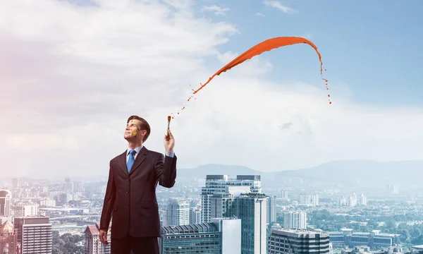 Conceptual Image Ambitious Creative Businessman Black Suit Holding Paintbrush Hand — Stock Photo, Image