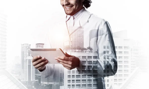 Double Exposure Confident Doctor White Sterile Coat Wirh Modern Cityscape — Stock Photo, Image