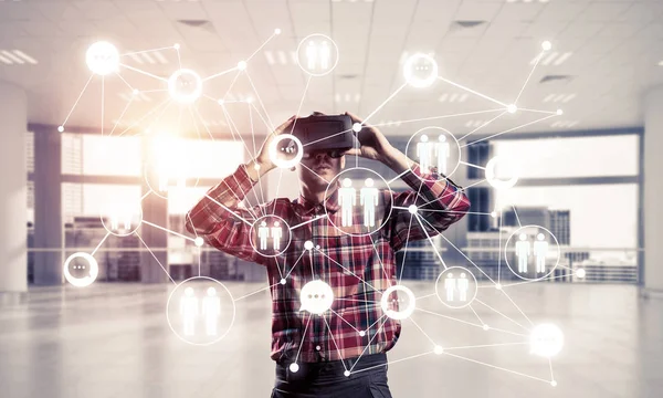 Young Man Virtual Reality Headset Glasses Connection Background Mixed Media — Stock Photo, Image