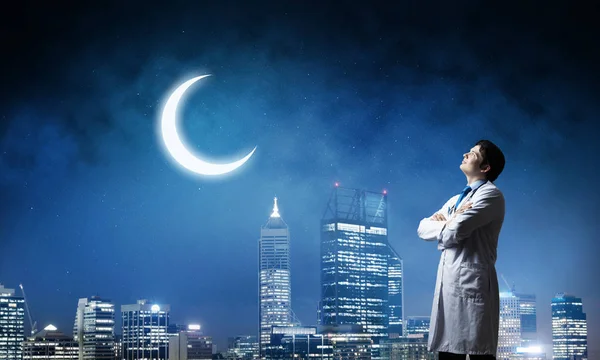 Conceptual Image Confident Doctor Keeping Arms Crossed While Standing Night — Stock Photo, Image