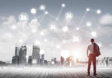 Modern şehir manzarası ve bağlantı konseptine bakan işadamlarının arka planı