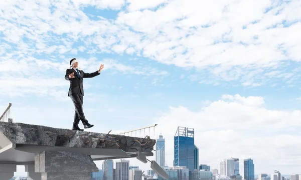 Businessman Walking Blindfolded Concrete Bridge Huge Gap Symbol Hidden Threats — Stock Photo, Image