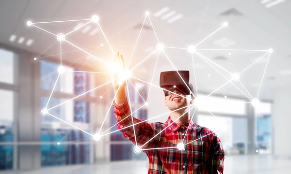 Young Man Virtual Reality Headset Glasses Connection Background Mixed Media — Stock Photo, Image