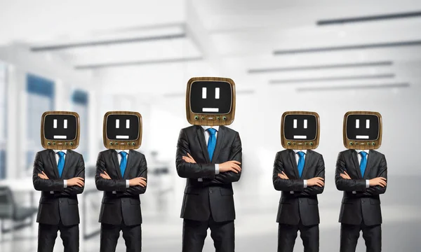 Businessmen with old TV instead of head.