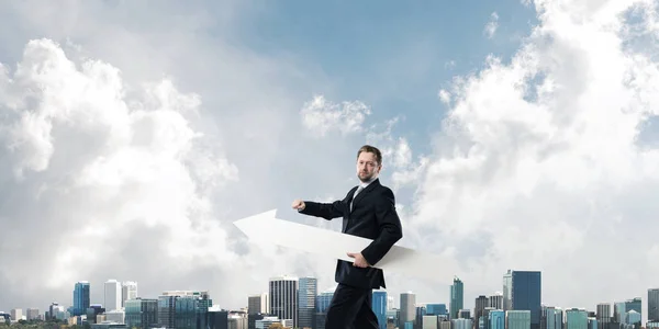 Cropped Image Successful Young Businessman Holding Big White Arrow Pointing — Stock Photo, Image