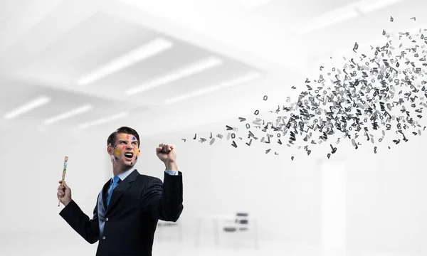 Conceptual Image Cheerful Young Businessman Black Suit Gesturing Smiling While — Stock Photo, Image