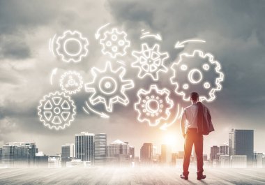 Modern şehre bakan ve vites düzeneği çizen işadamlarının arka planı