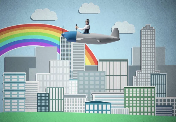 Businessman flying in small propeller plane above metropolis. Aviator driving retro airplane on background of city. Cityscape with high skyscrapers and colorful rainbow. Flying dreams concept