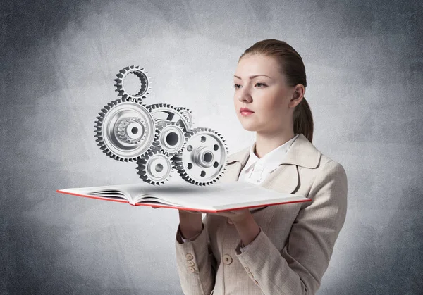 Woman Showing Abstract Mechanism Cogwheels Open Book Construction Manufacturing Mechanical — Stock Photo, Image