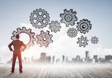 Modern şehre bakan ve vites düzeneği çizen işadamlarının arka planı