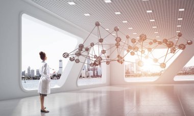 Hastane binası içinde ayakta iken sosyal ağ yapısı ile interracting tıbbi sanayi çalışanı kavramsal görüntü. Tıbbi sanayi için modern teknolojiler