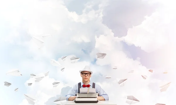 Young Man Writer Hat Eyeglasses Using Typing Machine While Sitting — Stock Photo, Image