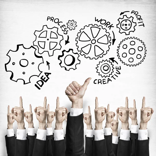 Group of hands of businesspeople showing gestures on wooden background