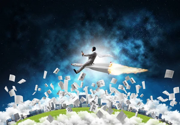 Conceptual image of young businessman in suit flying on rocket among flying papers with planet Earth and open space on background.