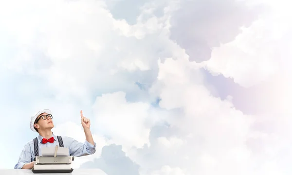 Young Man Writer Hat Eyeglasses Using Typing Machine Pointing Upside — Stock Photo, Image