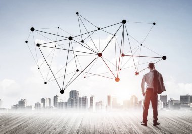 İşadamı arkasını kolluyor ve ağ çizimi kavramına bakıyor