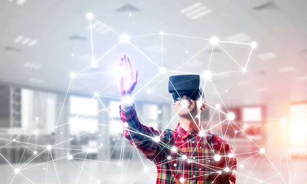 Young Man Virtual Reality Headset Glasses Connection Background Mixed Media — Stock Photo, Image