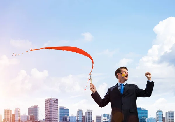 Young Successful Businessman Black Suit Holding Paintbrush Hand Smiling While — Stock Photo, Image