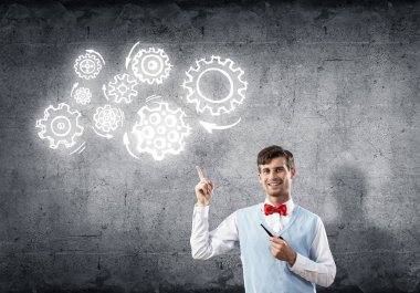 Takım çalışması konsepti olarak kırmızı kravat ve vites giyen zarif bankacı