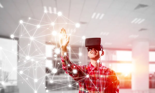 Young Man Virtual Reality Headset Glasses Connection Background Mixed Media — Stock Photo, Image