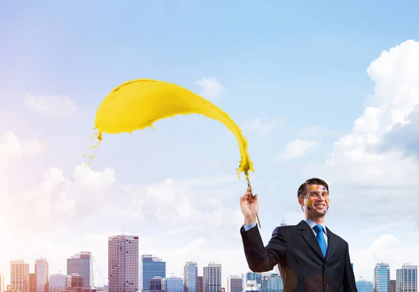 Horizontal Shot Young Happy Businessman Black Suit Holding Paintbrush His — Stock Photo, Image