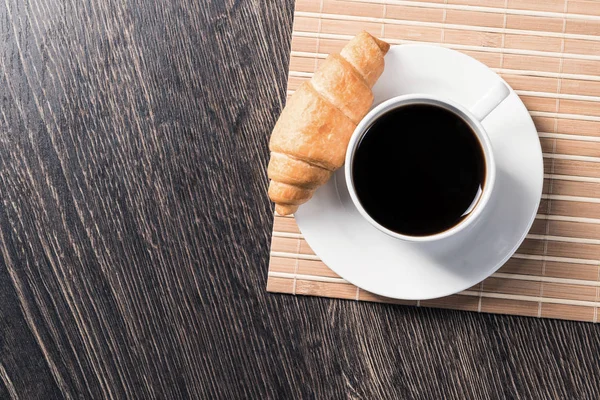 Cup of espresso coffee on wooden table — Stock Photo, Image