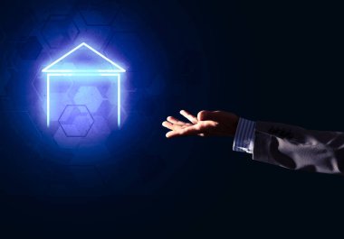 Koyu arkaplanda ev ya da ana sayfa simgesine elle işaret edilen kavramsal resim