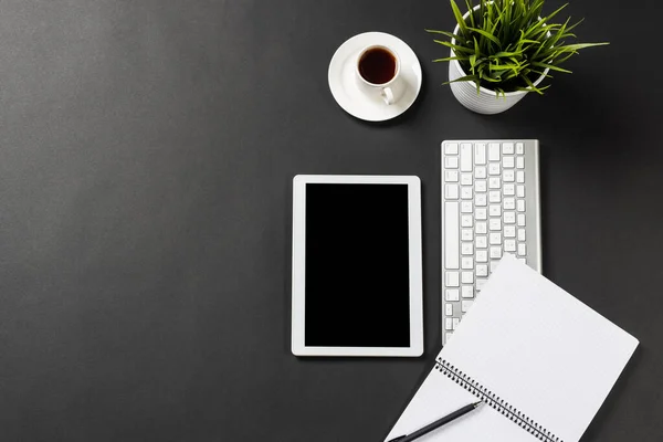 Top view of modern workplace with tablet computer — Stock Photo, Image