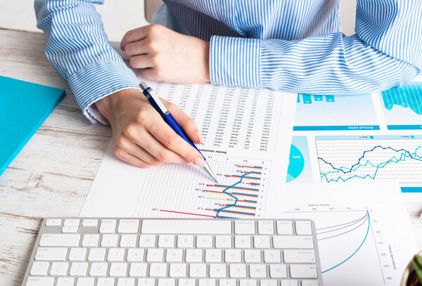 Investment manager analyze financial diagram