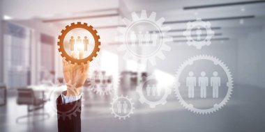 Takım çalışması konsepti ve zarif modern iç mekanlarda iş adamlarının jestlerini seçmek