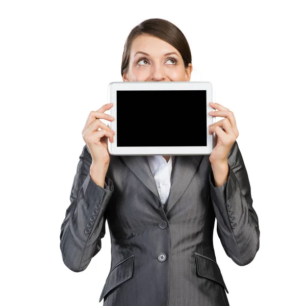 Businesswoman with tablet computer looking upwards — Stock Photo, Image