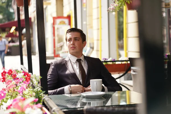 Young Businessman Came Lunch Cafe Sits Table Waits Someone — Stock Photo, Image