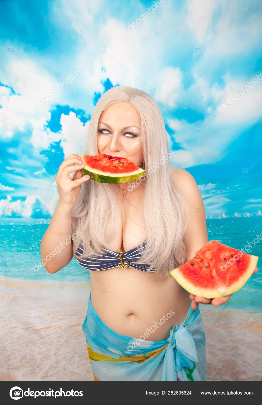 Charming Plump Blonde Big Breasts Swimsuit Stands Piece Watermelon Enjoys  Stock Photo by ©agnadevi 252605624