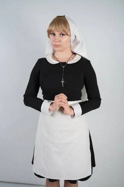 Praying Caucasian Nun Stands Black Dress White Apostolic Cap Cross — Stock Photo, Image