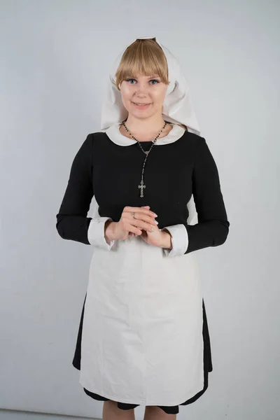 Praying Caucasian Nun Stands Black Dress White Apostolic Cap Cross — Stock Photo, Image