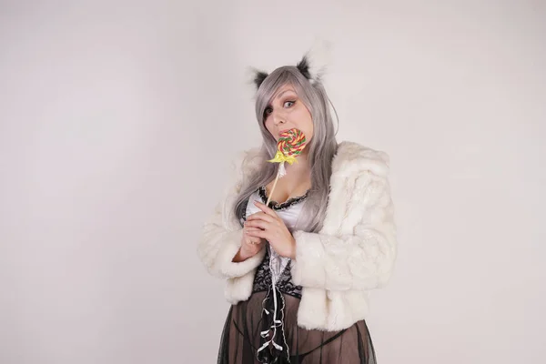 sexy chubby girl wearing maid transparent lingerie dress and wolf ears with furry tail on white background alone